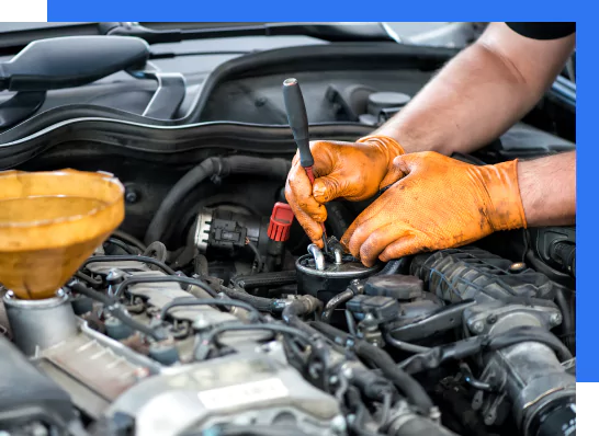 Mechanic working on a diesel filter, close up